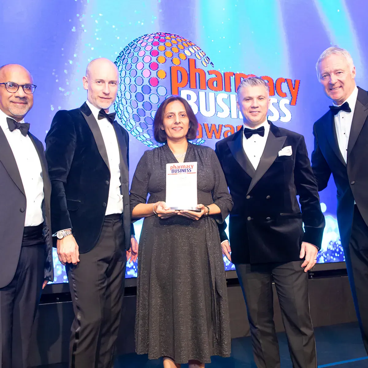 Pritee and the Howletts Pharmacy team receiving the Patient Care Award at the Pharmacy Business Awards