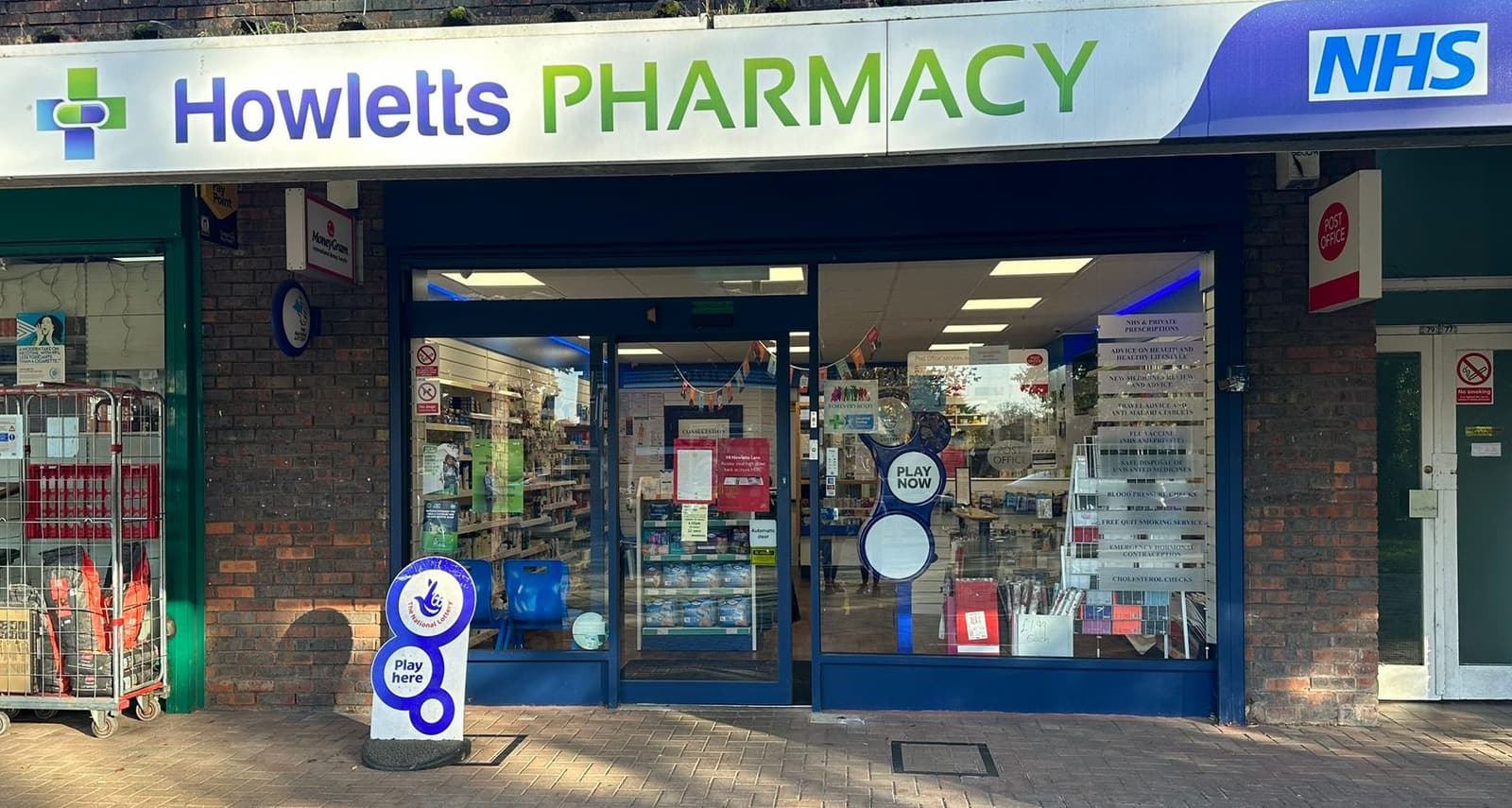 The Howletts Pharmacy storefront on Howletts Lane in Ruislip